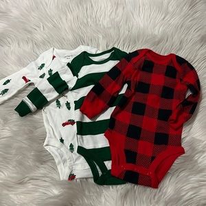 Carters. Never worn onesies. Size 3 months.